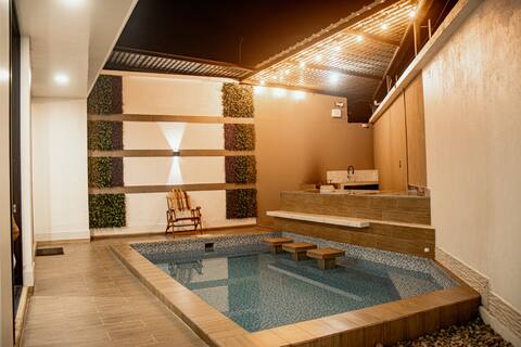 House with a swimming pool, BBQ area, and air conditioning