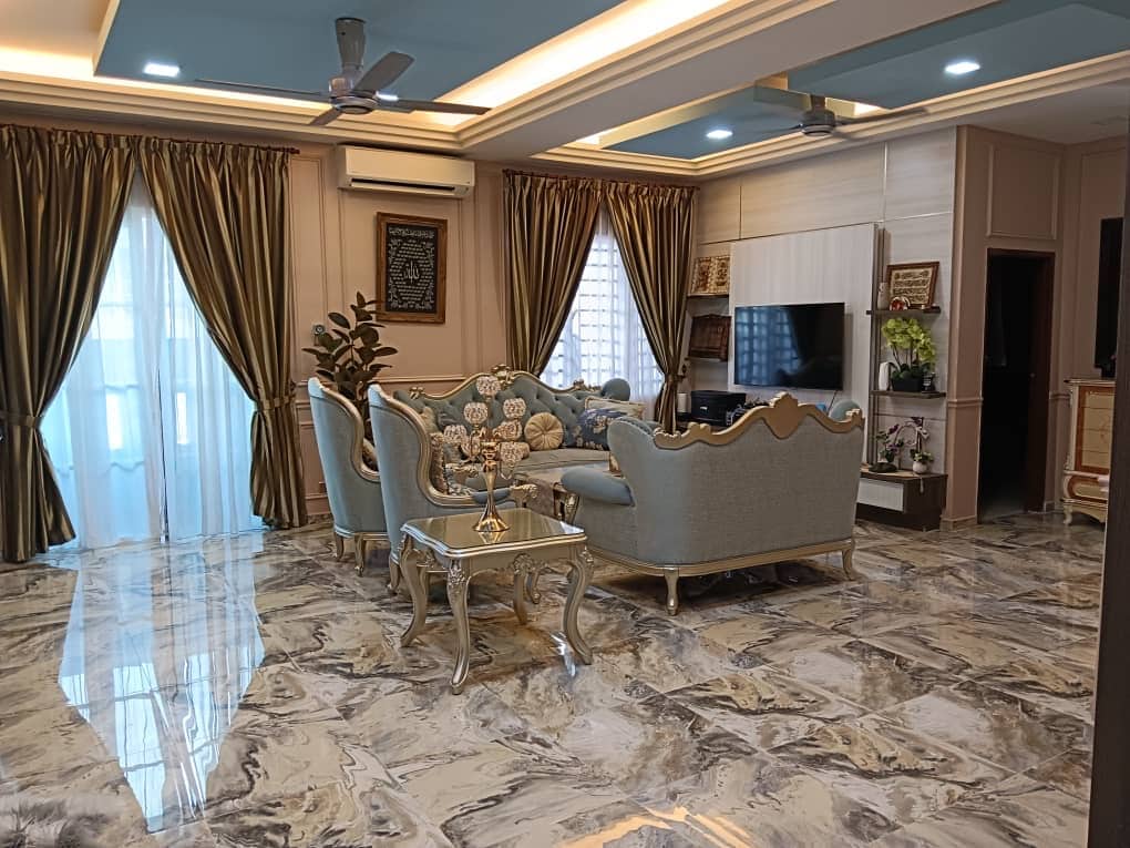 A spacious living area is highlighted by elegant furnishings, including a soft blue seating arrangement and a glass coffee table. Large windows are adorned with flowing curtains, allowing natural light to brighten the polished marble floor. A modern entertainment unit is situated against the wall.
