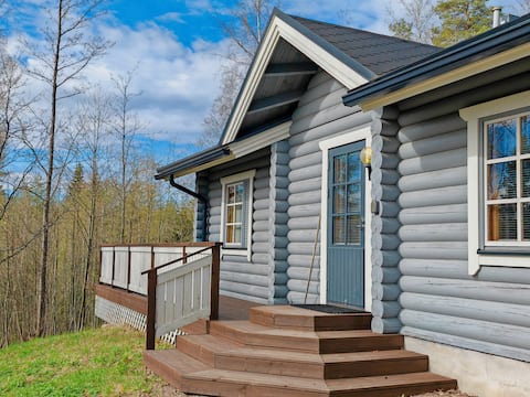 Cozy log cabin in the peace of nature