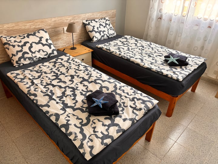 Segundo dormitorio con camas individuales 