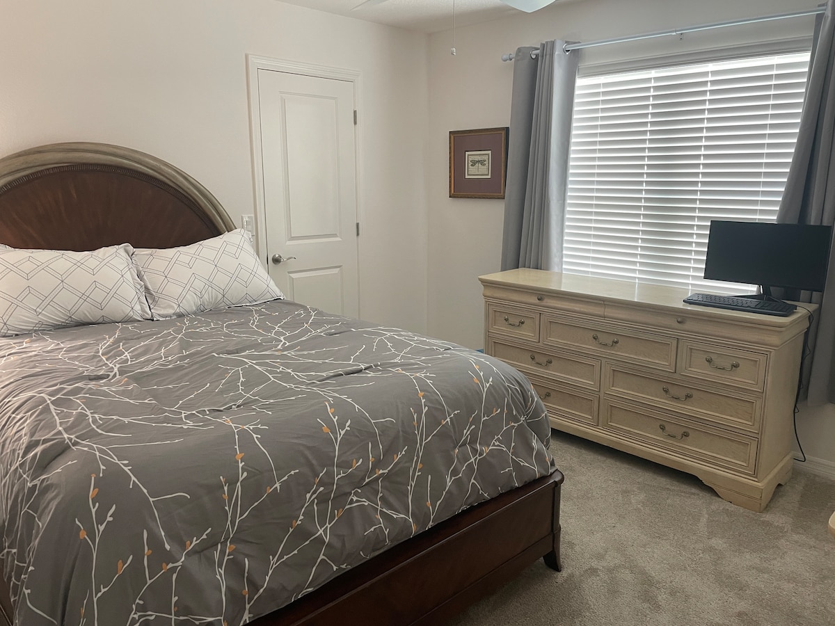 Horizontal style dresser shown in this room.  Also room darkening blinds and curtains to ensure sunshine waits till you are ready to get up. 