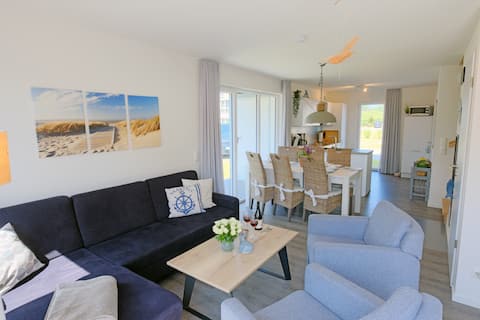 Top performing Airbnb: View of the sea - Corner house terrace beach sauna in Wangerland