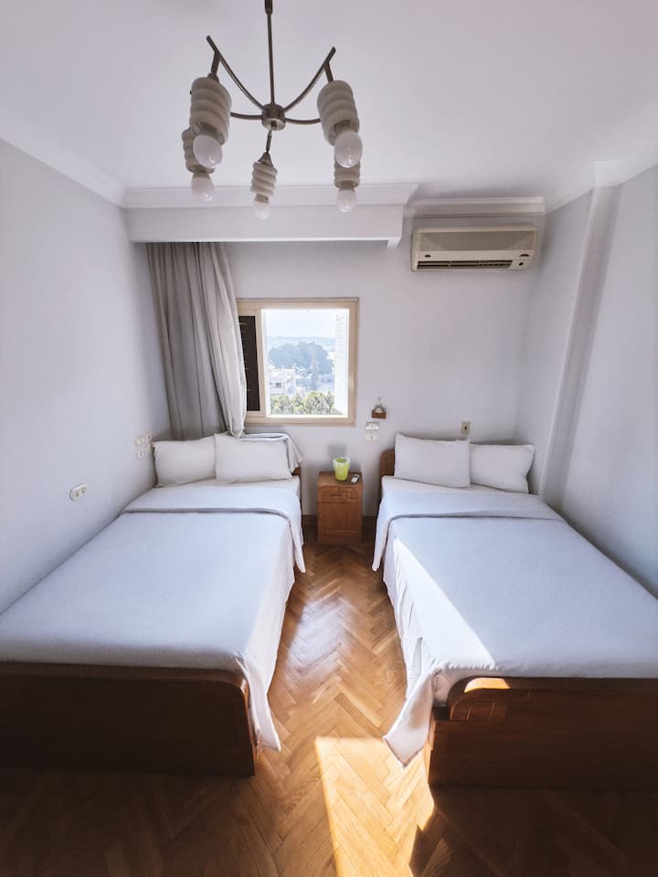 Ideal for siblings or travel companions, with two comfortable beds, ample storage, and double-glazed windows to reduce outside noise.