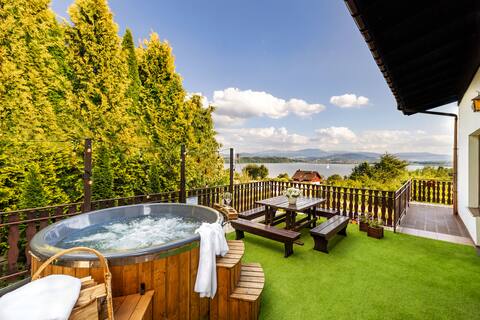 Lakefront Log Home with Hot Tub
View of the mountains