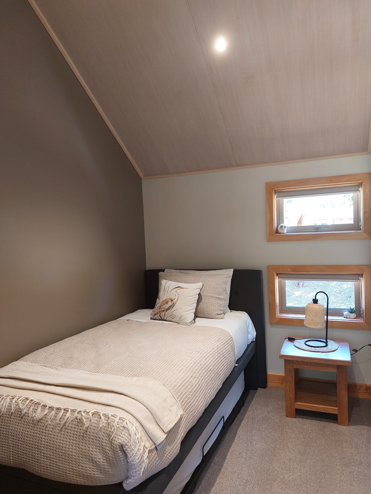 The second bedroom houses a king single trundler bed that can be extended to a double bed or an extra single matrass can be pulled out and made up as an extra bed if needed. 