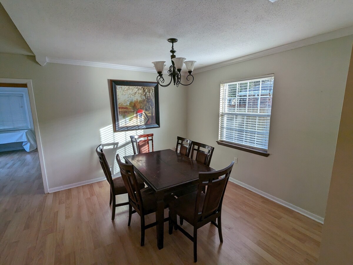 Bright dining room with modern table and chairs