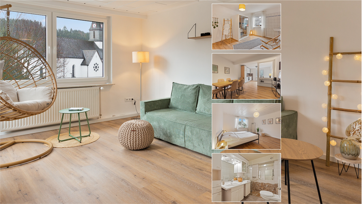 A bright living area features a spacious green sofa, a hanging chair, and a round wooden table. Natural light fills the room through a large window, offering a view of the surroundings. Warm wooden flooring complements the neutral color palette.