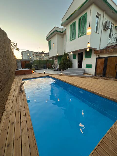Green Blinds and Garden Villa