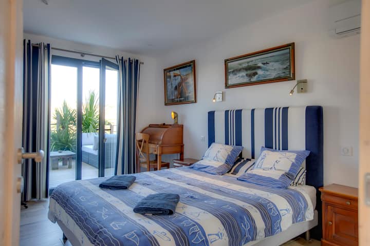 Villa de la dune - Seignosse: חדר שינה בקומת הקרקע הפתוח למרפסת מערבית