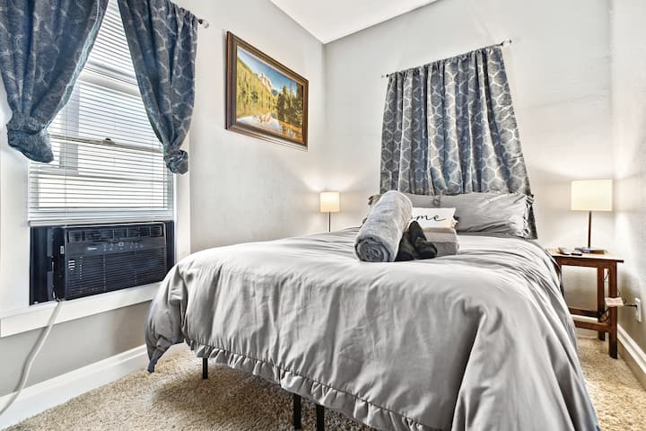 Thoughtfully prepared and warmly lit: this serene bedroom welcomes you to rest, recharge, and feel at home.