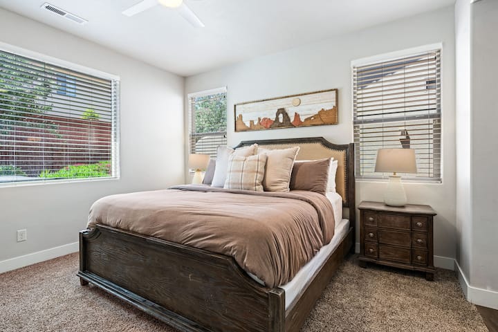 This is the master bedroom with attached master bath.  Two sleeping pads are also provided for this room.  There is also a large closet that fits a pack and play and can be used to put a baby to bed.  Smart TV with Roku to stream your favorite shows.