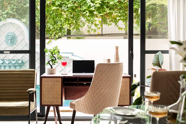 Ground Floor: Living Area with workstation facing the pool