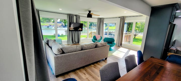 Sala da pranzo e veranda con vista sul lago.