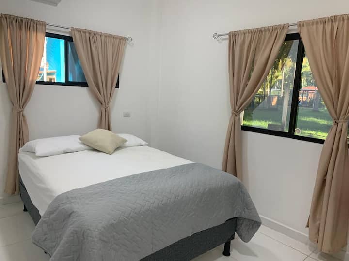 Bedroom 2 has 1 double bed,  A/C and a table, 