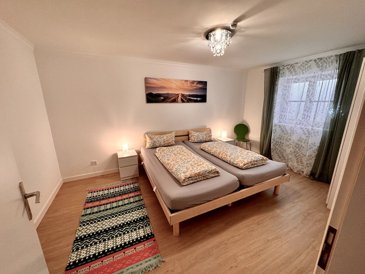 Slaapkamer met een 2-persoonsbed