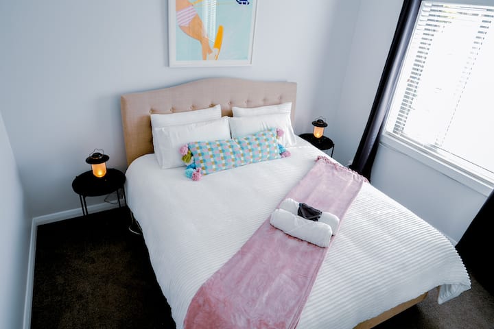 King size pillow top mattress Bed, Ceiling fan, block out curtains, TV 