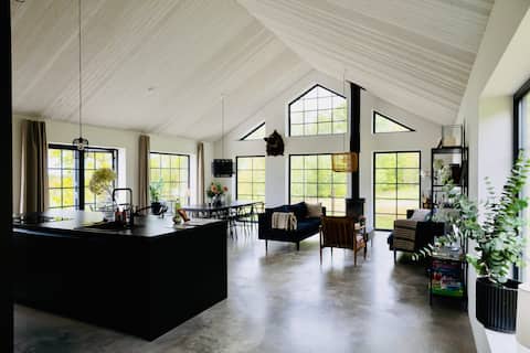 Modern house with spa bath in a rural setting