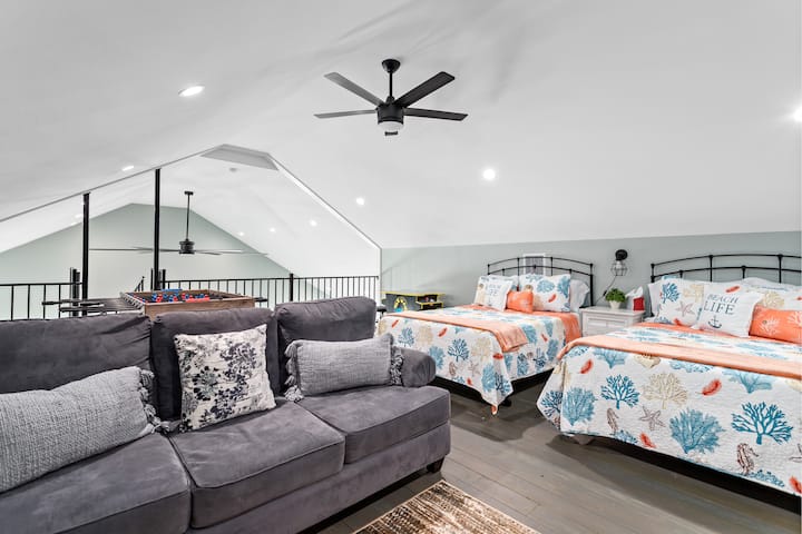 Loft with private living space, TV, Board games, Arcade and Foosball.