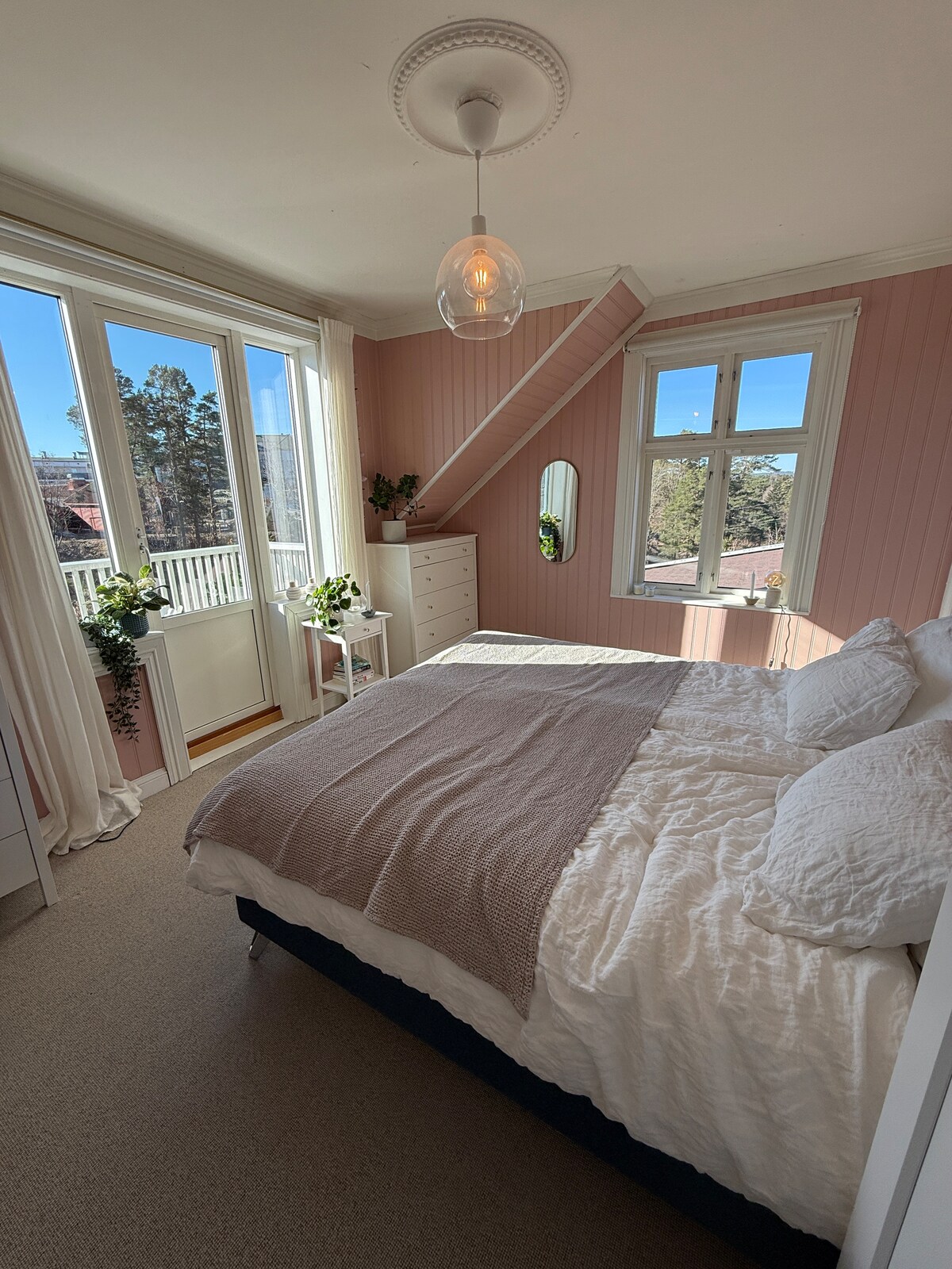 The master bedroom offers lovely views and an airy atmosphere. Here you will find a spacious king size bed and exit to a private balcony.