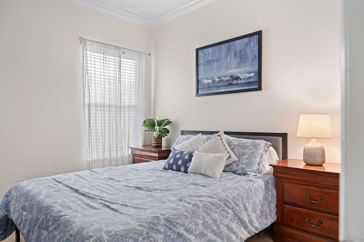  Unwind in this light-filled room adorned with thoughtful decor!