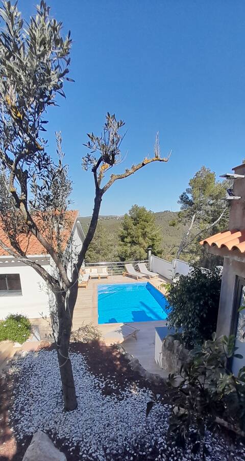 A gorgeous villa with a view, a large pool, terraces