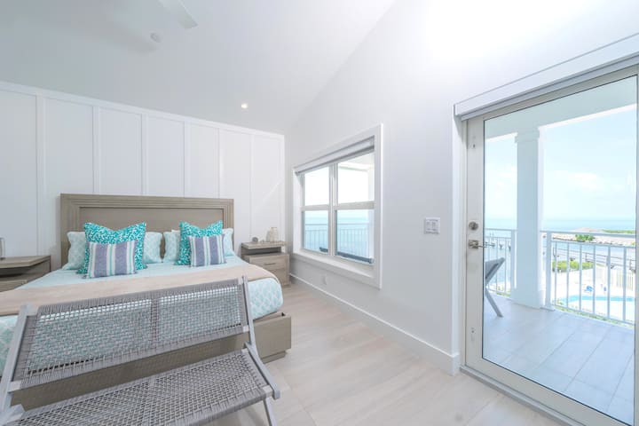 Primary Oceanfront Suite with a private oceanfront balcony attached at Paradise Palms. 
