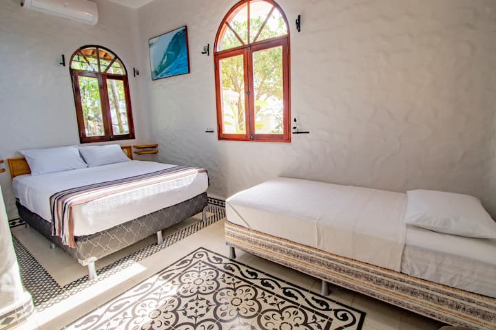 Located downstairs includes one Queen bed and one Twin Bed