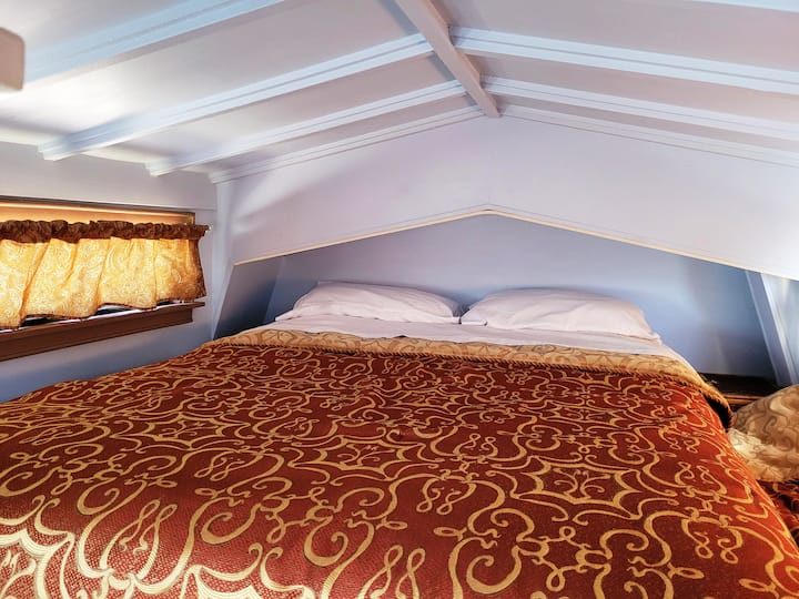 Queen bed in Celestial Sleeping Haven.