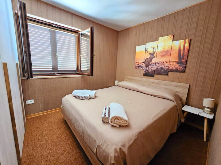 Double bed with mattress topper