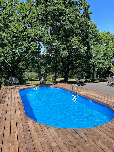 Summerhome with pool, saunas and SUP boards