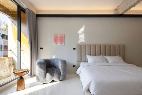 Airry white suite in designer casa near sky train