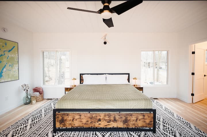Upstairs primary suite, aka Bedroom #1. Private walk in closet and full bathroom also located upstairs.