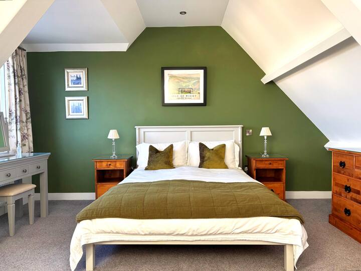 Bedroom 1 with king size bed and far reaching views