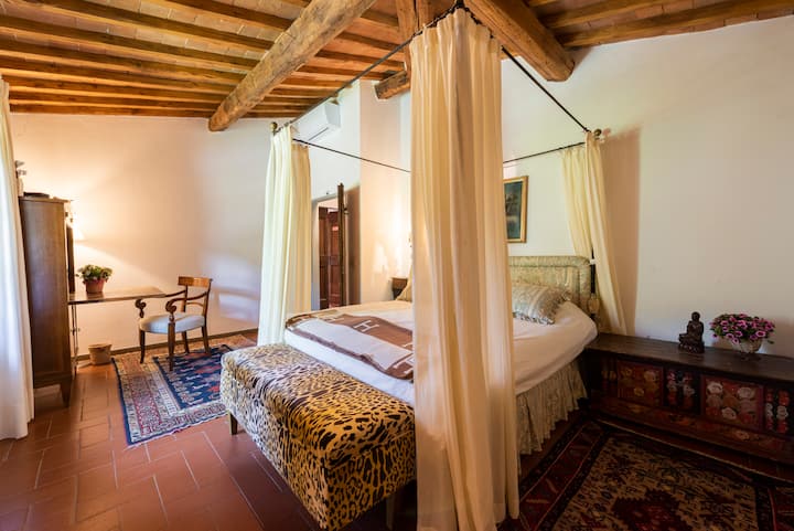 White room with private studio corner