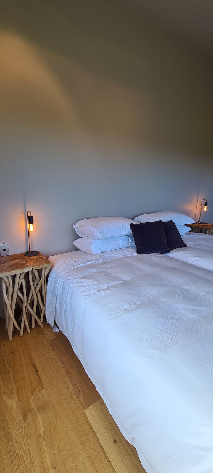 Bedroom 1 on the middle floor - can be set up with 3 King singles or it can be set as a Californian king with a king single,  bedroom 1 has an ensuite