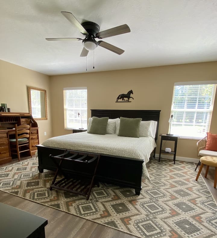 Roomy master has king bed.