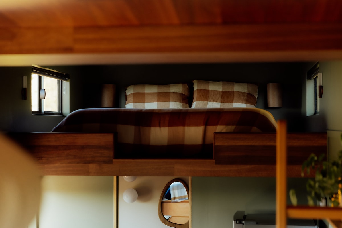 Our queen loft offers an additional sleeping space for a third guest. 