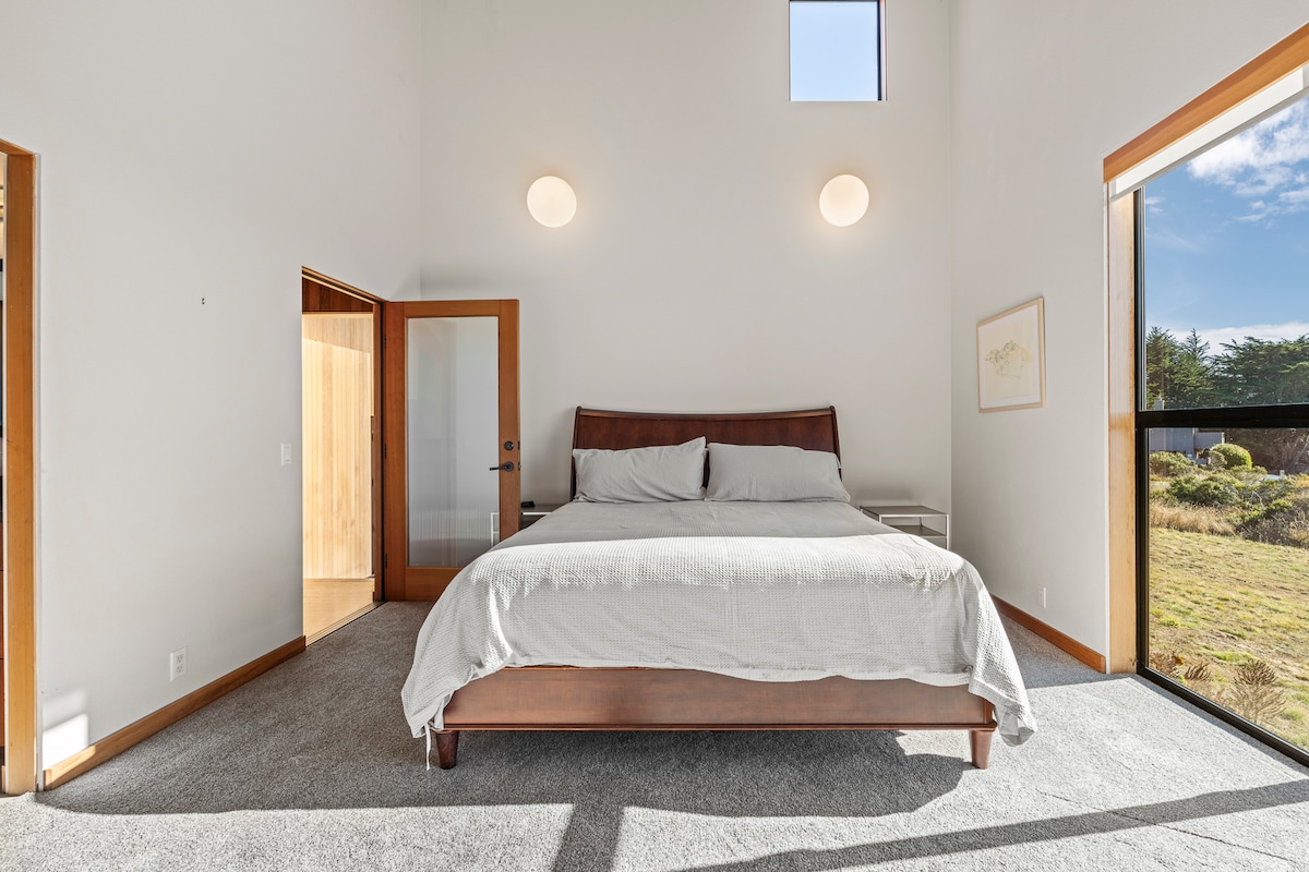 Open a window and listen to the waves as you fall asleep. 