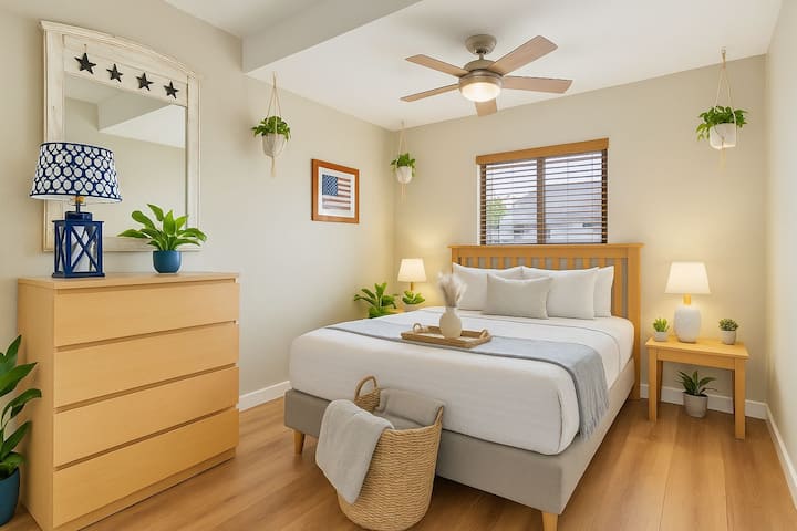 Master Bedroom.  Queen Bed.  Extra Ottomans that Fold into Twin Beds in Closet if Needed. 