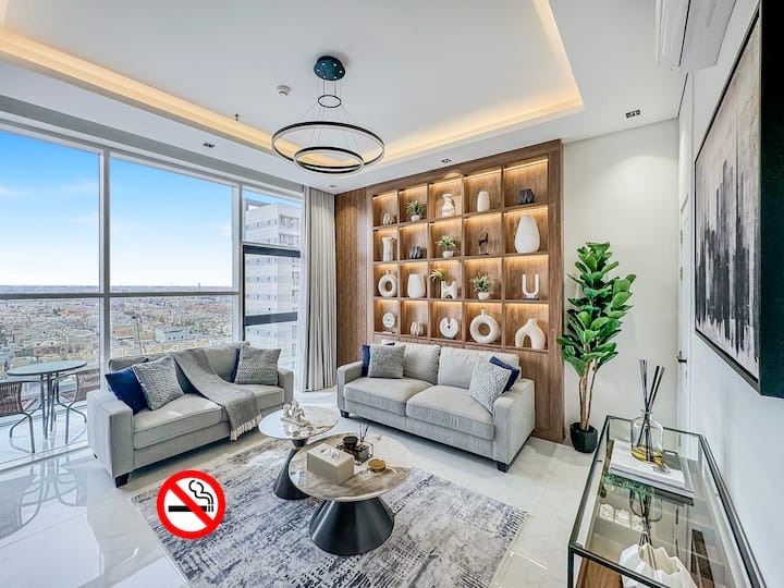 Top floor luxury condo with balcony in high-rise