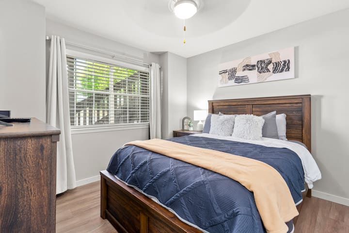 Relaxation awaits in the second bedroom, where comfort meets style. Equipped with a television and blackout curtains for lazy mornings.  
