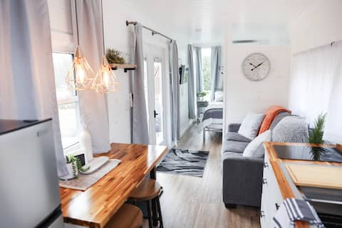 The Hideaway Container Tiny home | HOT TUB