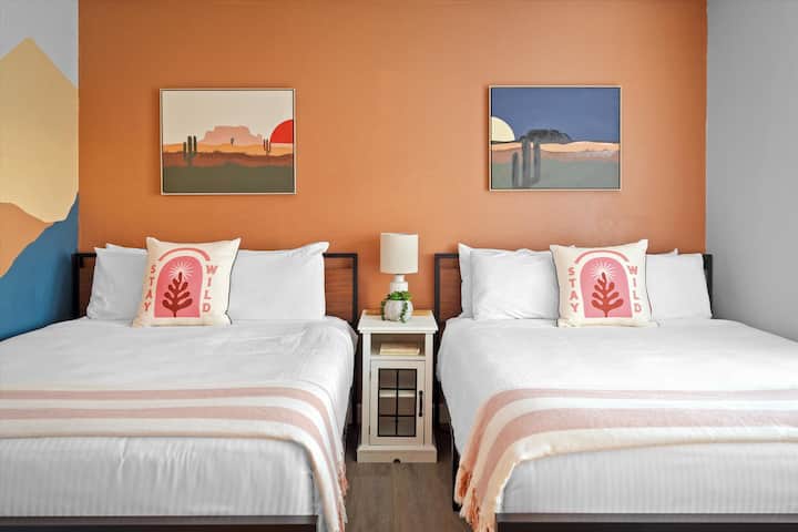 2 Full size beds and a custom painted mural