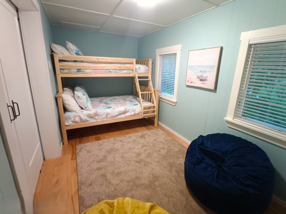 Second Bedroom with single over double bunk bed, tons of closet space and Roku TV.  Bean bag chairs to lay back.