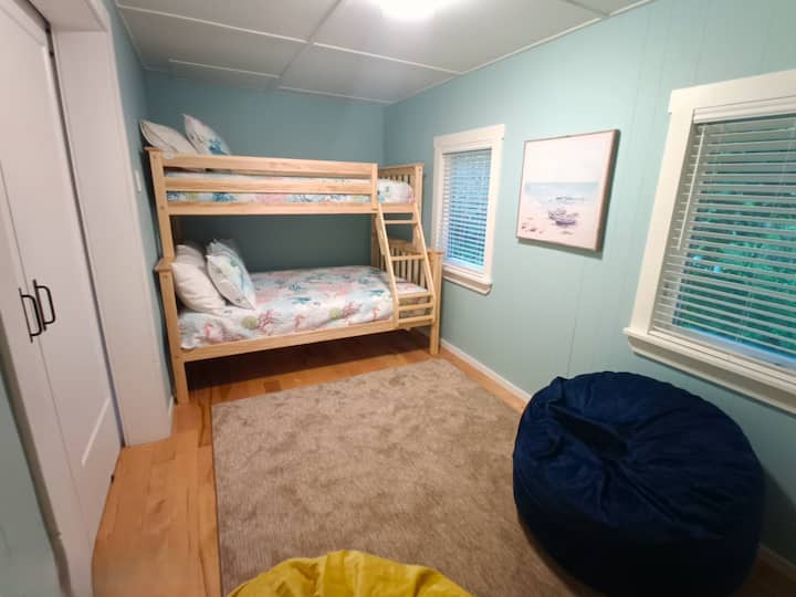 Second Bedroom with single over double bunk bed, tons of closet space and Roku TV.  Bean bag chairs to lay back.