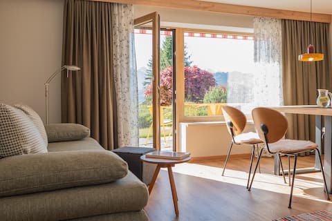 Garden apartment with a patio