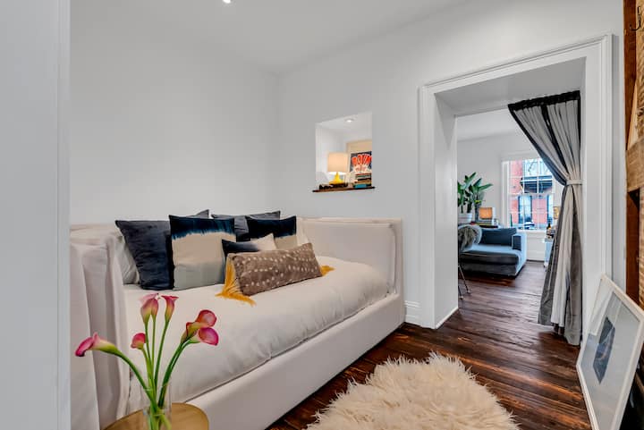 First floor sleeping snug tucked between the living room and dining room. Thick velvet curtains for privacy. Always the favorite sleeping room in the house!