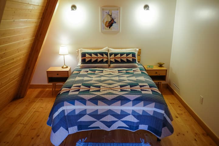 Queen bed with Pendleton bedding