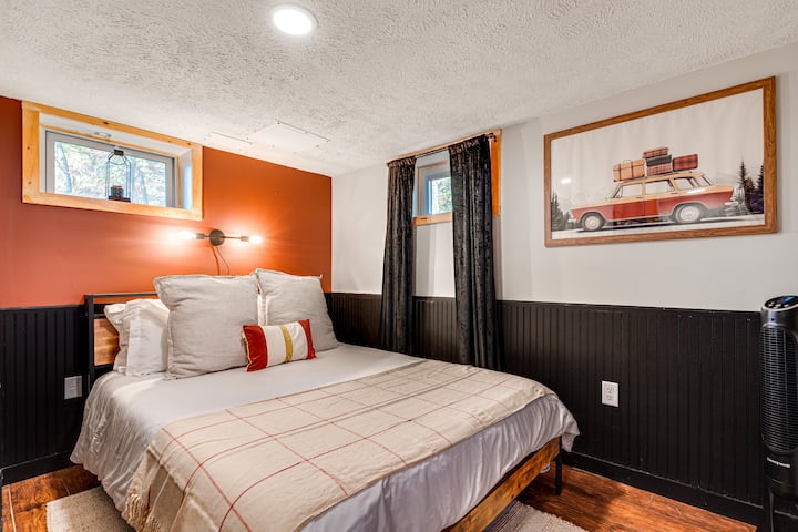 This bedroom is downstairs. A nice get away for the ones who want turn in early.