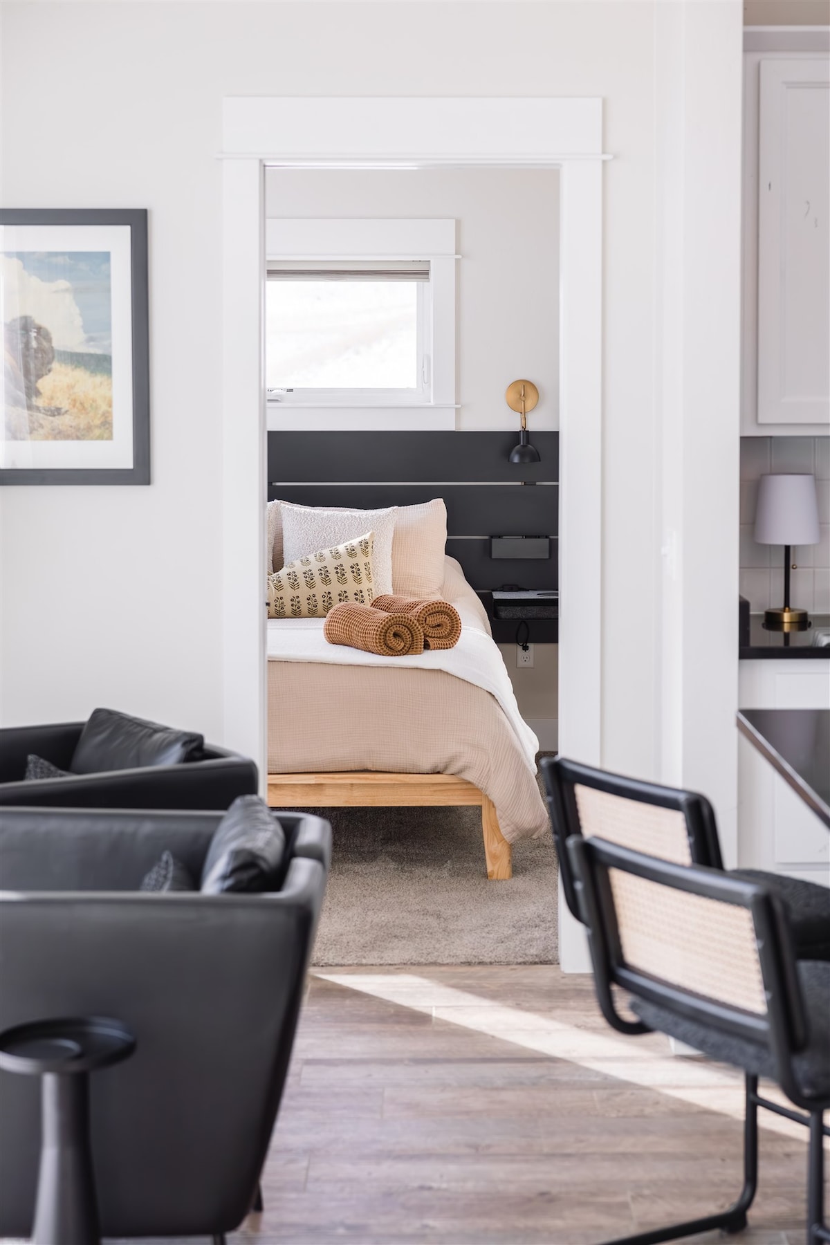 This Queen bedroom has brand new plush bedding from Quince.